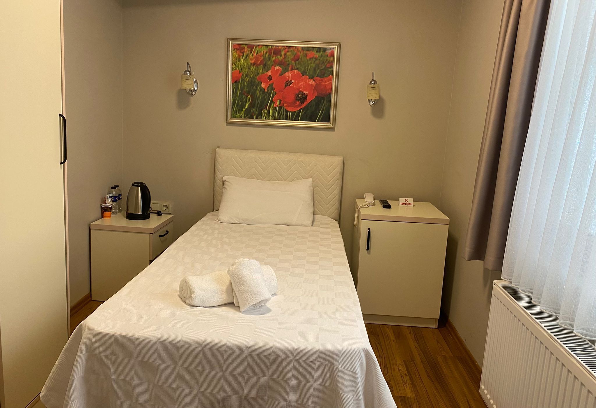 Chambre Simple Économique | Minibar, Wi-Fi gratuit, draps fournis
