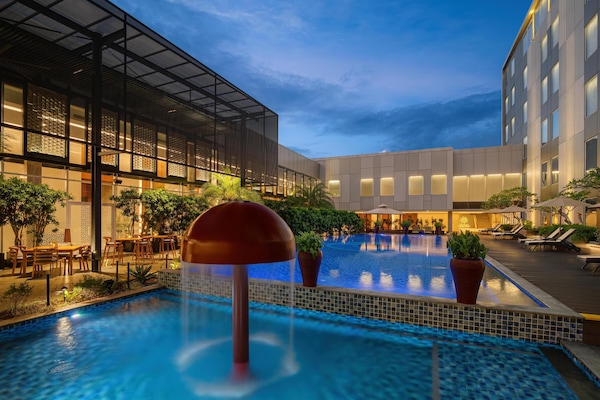 Outdoor pool, open 6:00 AM to 9:00 PM, pool umbrellas, sun loungers