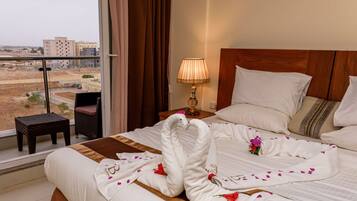 Superior Suite, 1 King Bed with Sofa bed, Balcony | 1 bedroom, in-room safe, individually furnished, desk