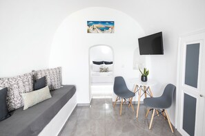 Studio, Sea View (2) | Living area | Flat-screen TV - White Side Suites (Santorini)