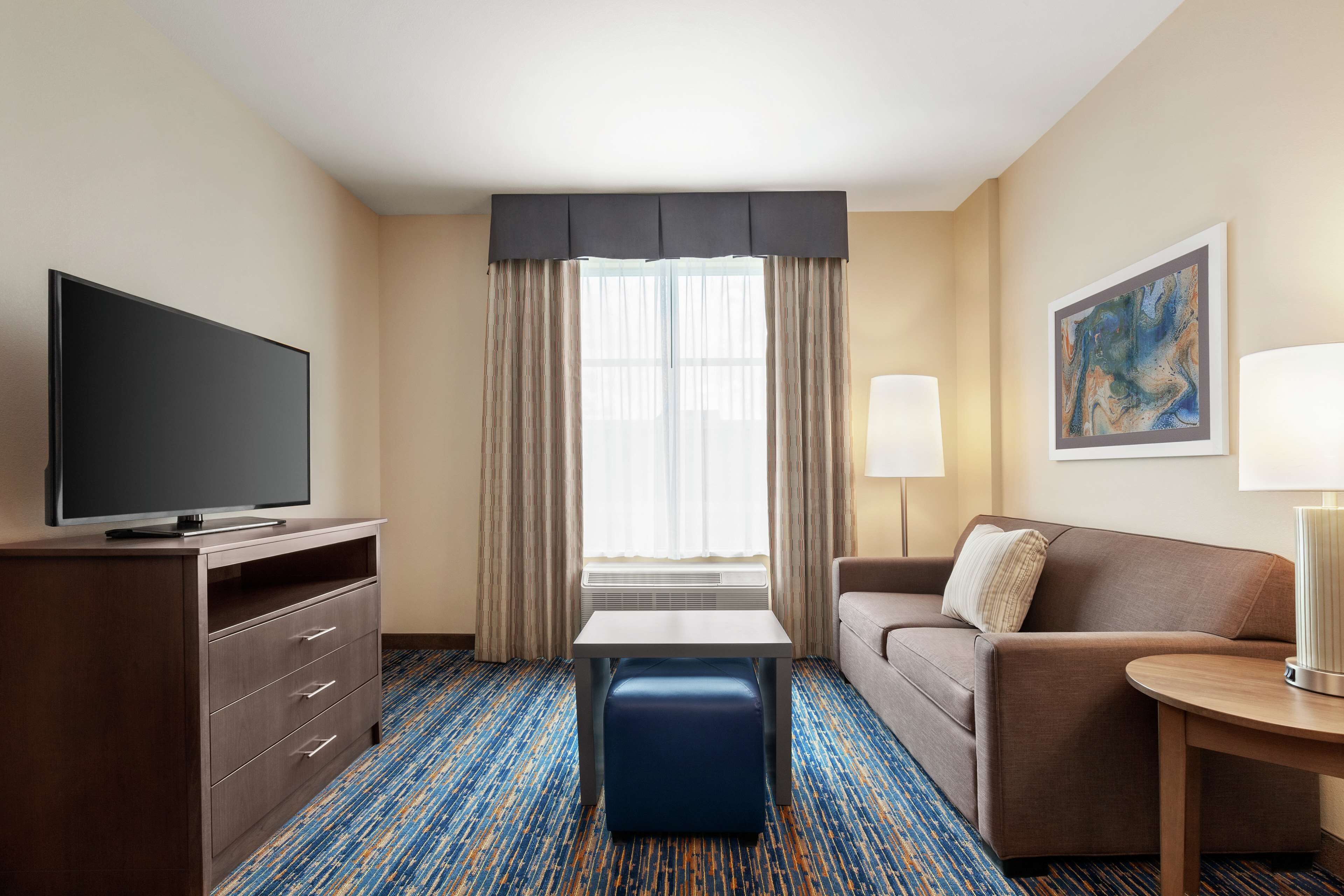 suite, 1 bedroom, non smoking | in-room safe, desk, blackout curtains, iron/ironing board