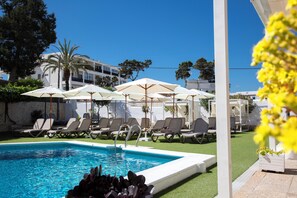 Seasonal outdoor pool, pool umbrellas, pool loungers