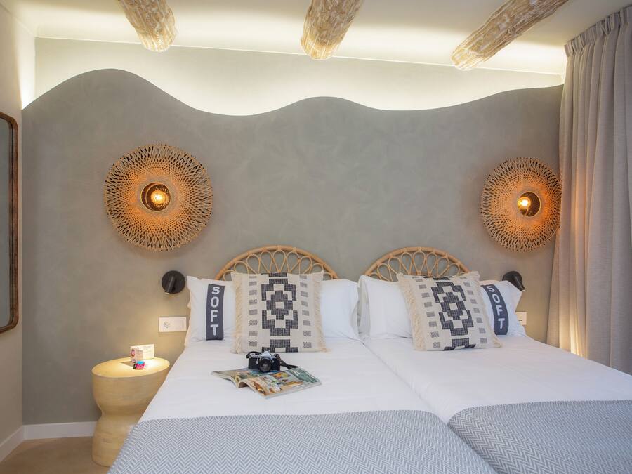 Triple Room, Terrace | Minibar, individually decorated, desk, free WiFi