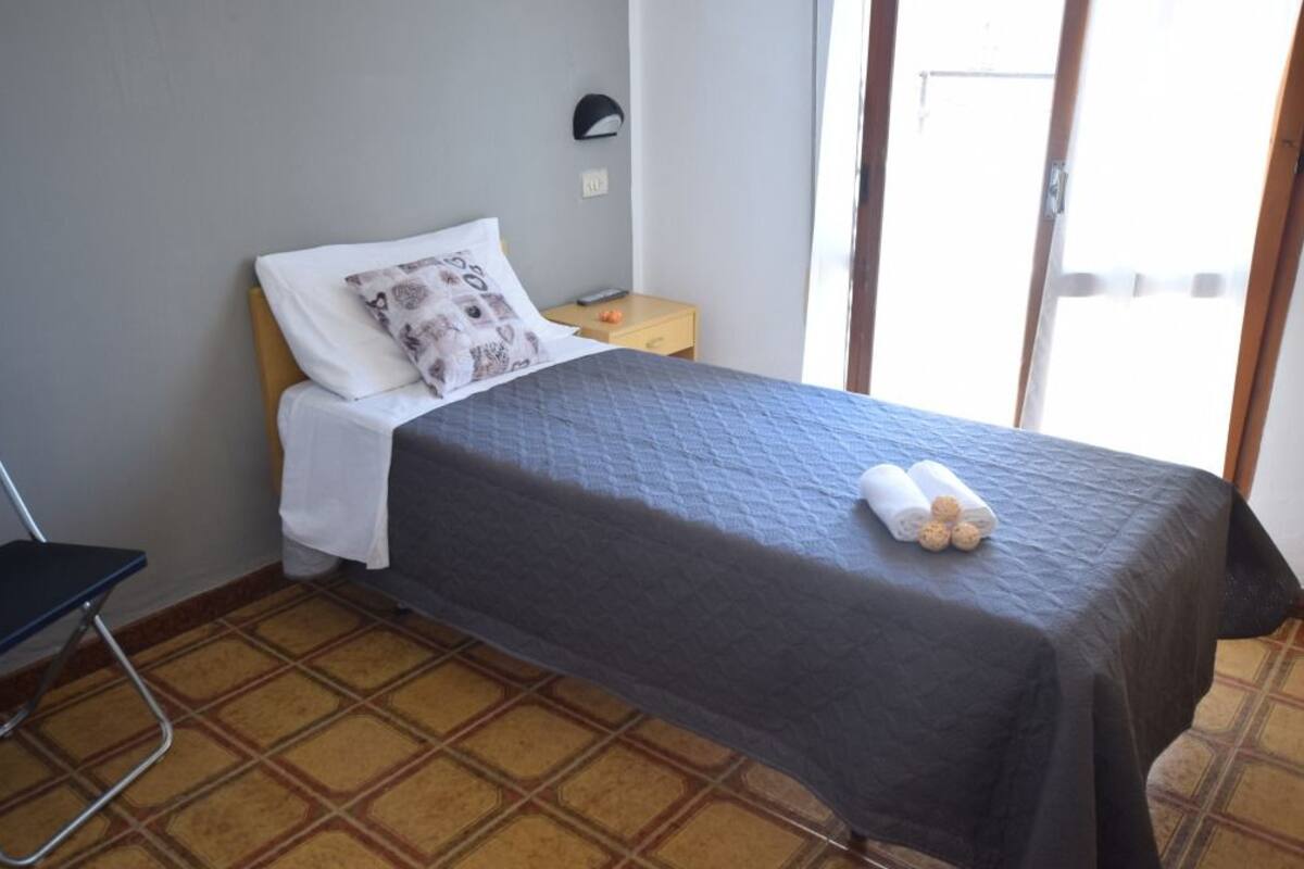 Habitación individual | Caja de seguridad en la habitación, cunas y ropa de cama 