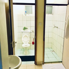 Family Apartment, 2 Bedrooms | Bathroom | Shower, free toiletries, slippers, towels