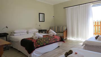 Family Room | Premium bedding, down comforters, desk, blackout drapes