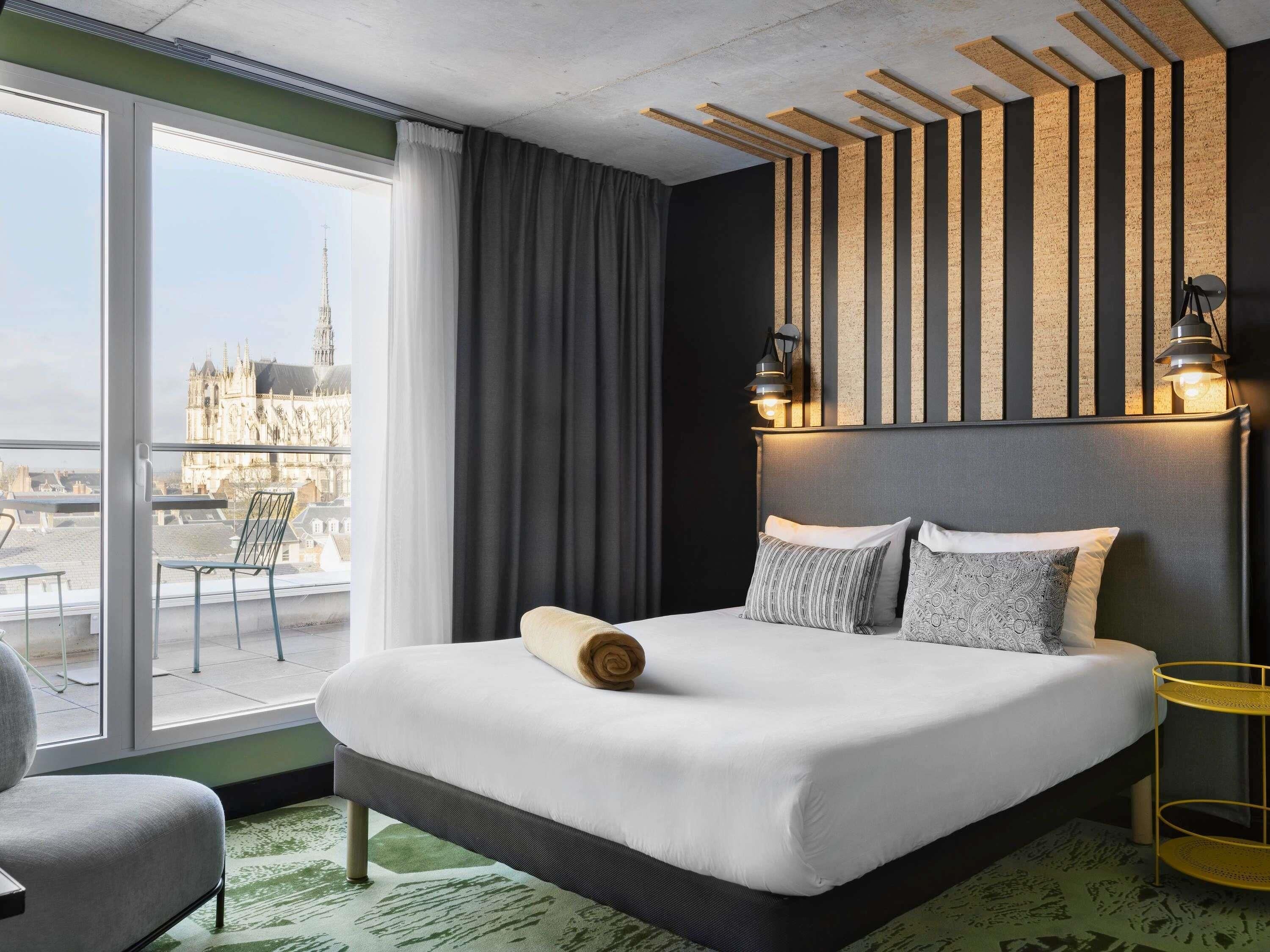 Premium bedding, pillow-top beds, blackout curtains, soundproofing