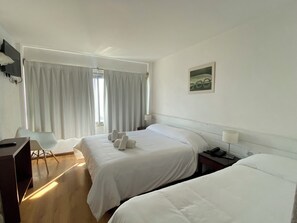 Habitación triple clásica | Ropa de cama 