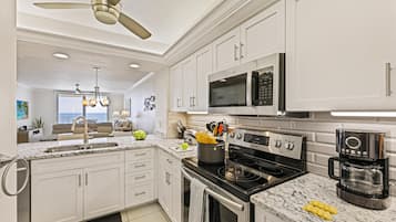 Condo, 1 King Bed with Sofa bed (Beachfront condo with huge views/pool) | Private kitchen | Fridge, microwave, oven, stovetop