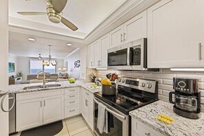 Condo, 1 King Bed with Sofa bed (Beachfront condo with huge views/pool) | Private kitchen