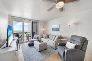 Condo, 1 King Bed with Sofa bed (Tradewinds 701) | Living area | Flat-screen TV