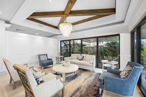 Condo, 1 King Bed with Sofa bed (Tradewinds 701) | Living area | Flat-screen TV