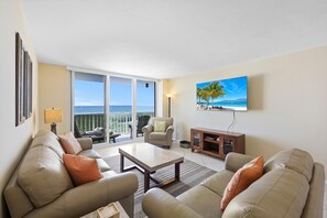 Condo, Multiple Beds (Stylish beachfront condo with pool an) | Living area