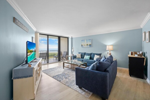 Condo, 1 King Bed with Sofa bed (Beachfront condo with pool and balcon) | Living area | Flat-screen TV