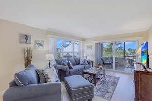 Condo, Multiple Beds (Bright condo in community with pool/s) | Living room | Flat-screen TV - Bright Condo in Community With Pool/steps to Beach (Marco Island)