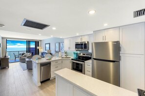 Condo, 1 Queen Bed with Sofa bed (Charming beachfront condo with pool, ) | Private kitchen | Fridge, microwave, stovetop, dishwasher