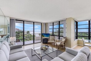 Condo, 1 King Bed (Front unit facing beach with wraparou) | Living room | Flat-screen TV - Front Unit Facing Beach With Wraparound Balcony (Marco Island)