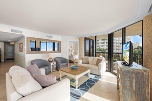 Condo, Multiple Beds (Stylish beachfront condo with spa/poo) | Living area