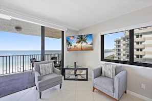 Condo, 1 King Bed with Sofa bed (Inviting beachfront condo with pool, ) | Living area | Flat-screen TV - Inviting Beachfront Condo With Pool, spa and Views (Marco Island)