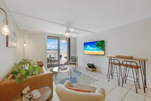 Condo, Multiple Beds (Alluring beachfront condo with pool a) | Living area | Flat-screen TV - Alluring Beachfront Condo With Pool and Ocean Views (Marco Island)
