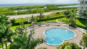 Condo, 1 King Bed with Sofa bed (Alluring beachfront condo with pool a) | Outdoor pool | A heated pool