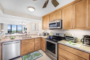 Condo, 1 King Bed with Sofa bed (Alluring beachfront condo with pool a) | Private kitchen | Fridge, microwave, oven, stovetop
