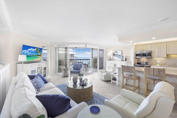 Condo, 1 King Bed (Cozy beachfront getaway with pool and) | Living area | Flat-screen TV - Cozy Beachfront Getaway With Pool and spa (Marco Island)