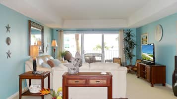 Condo, 1 cama King size (Caxambas Towers 103) | Área de sala de estar | Televisión