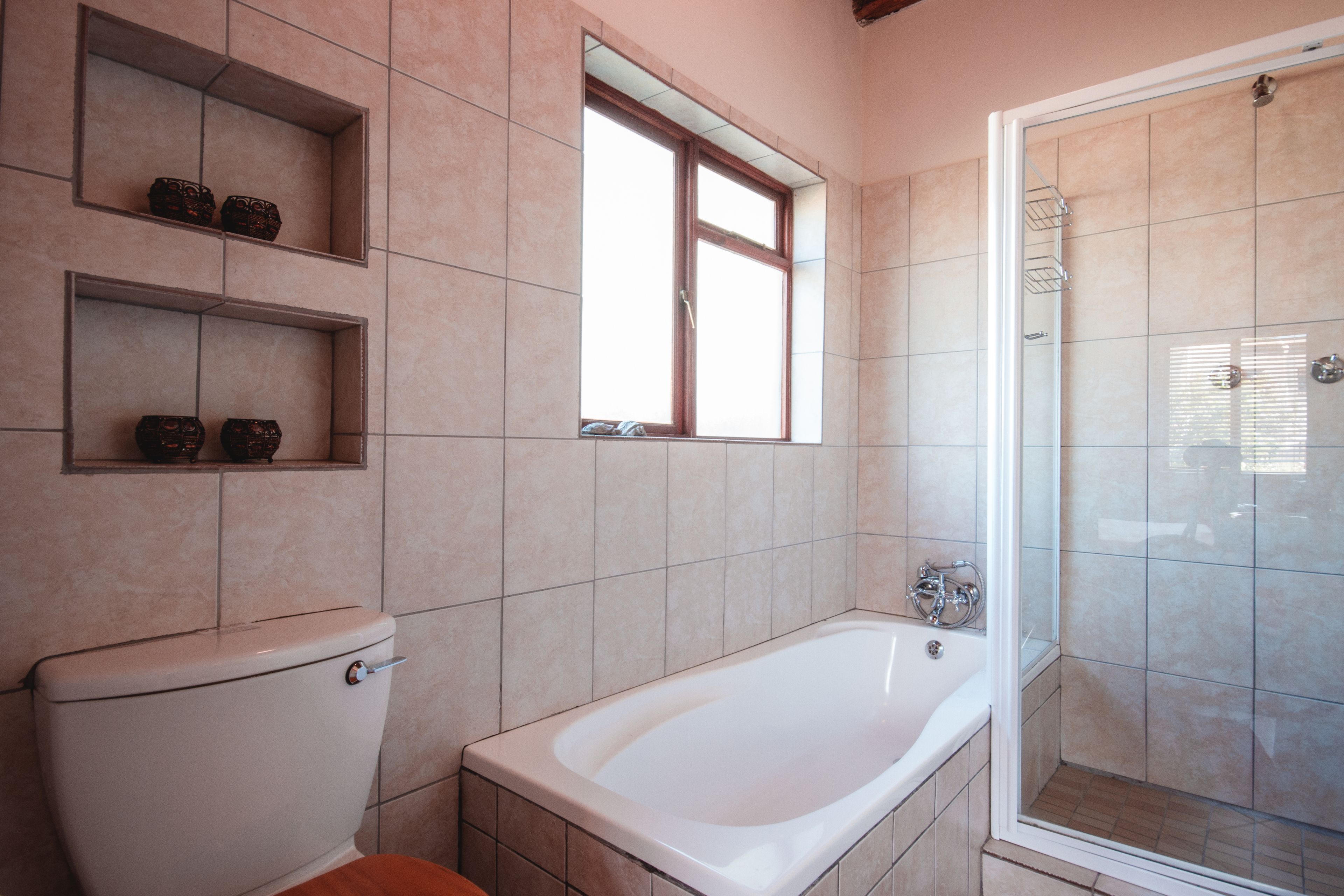 Berry Cottage | Bathroom | Rainfall showerhead, hair dryer, towels