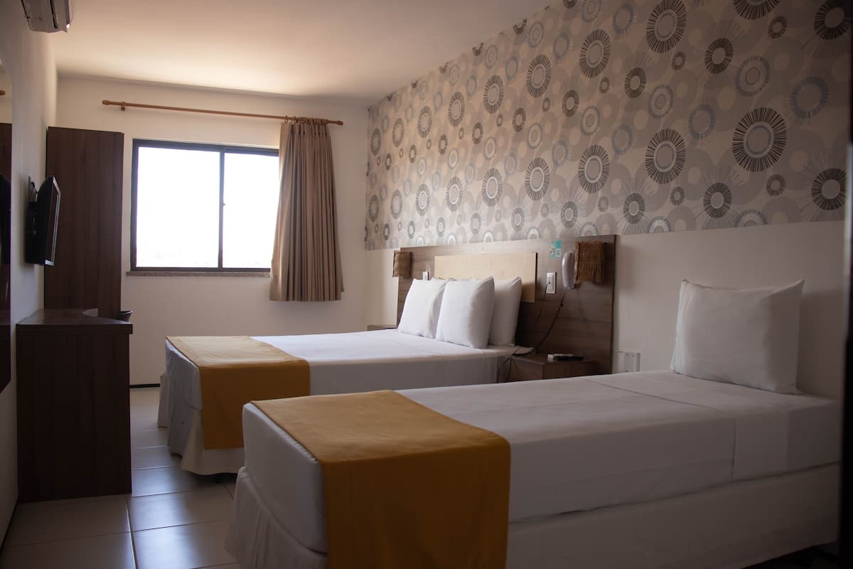 Standard Triple Room | Minibar, desk, blackout curtains, iron/ironing board