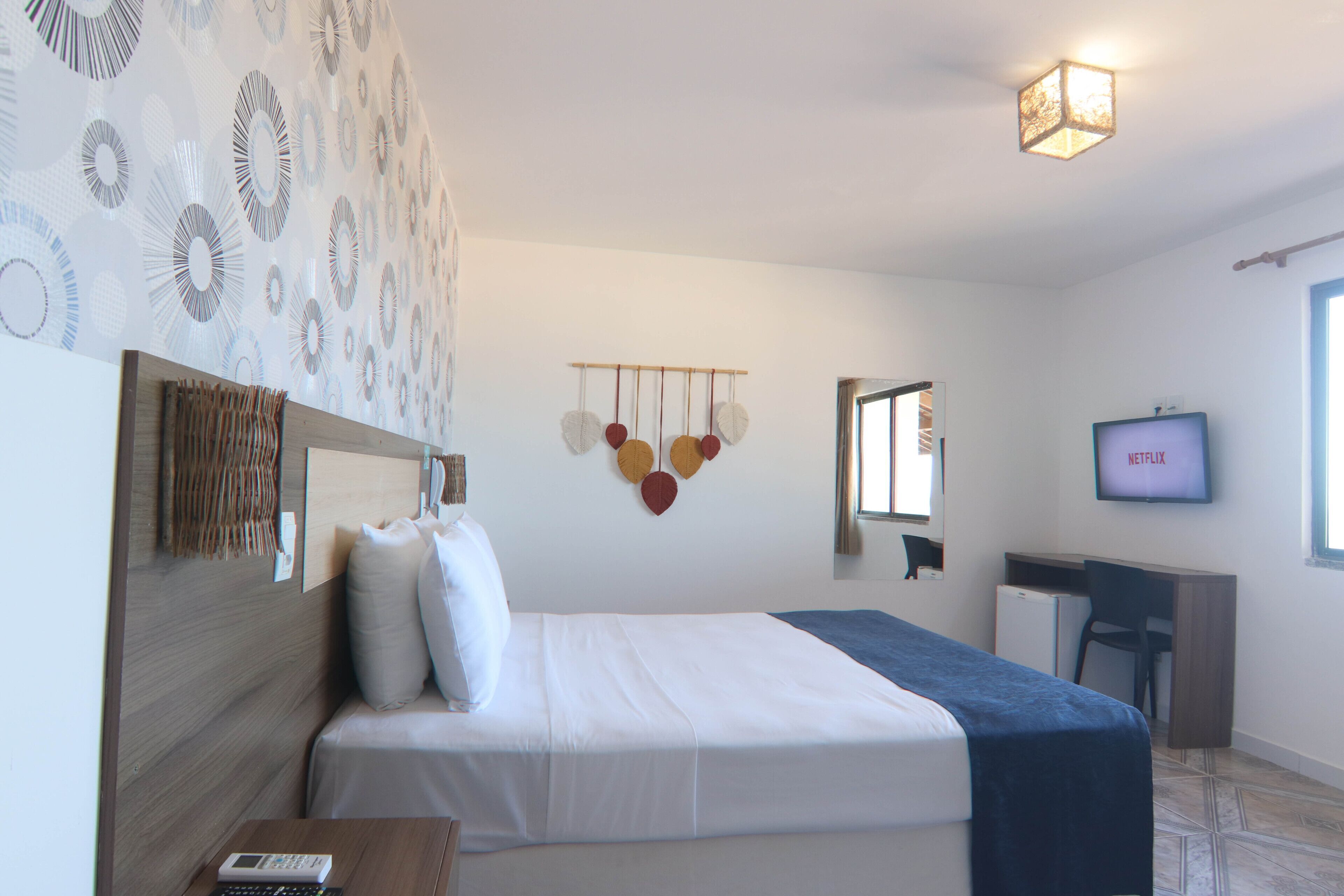 Minibar, desk, blackout curtains, iron/ironing board