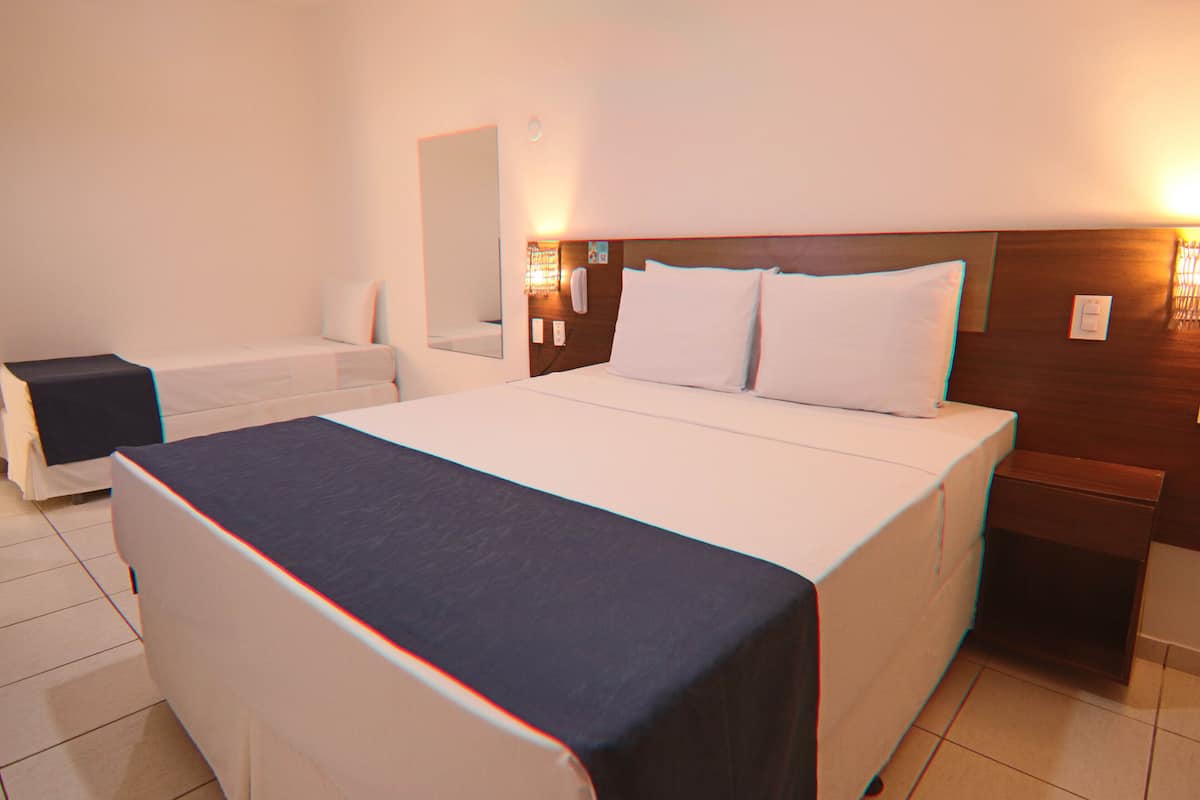 Deluxe Triple Room, Balcony, Ocean View | Minibar, desk, blackout curtains, iron/ironing board