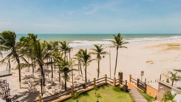 Na praia, toalhas de praia, bar na praia