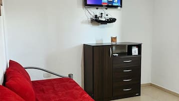 Comfort Cabin, 1 Bedroom | Living area | 32-inch plasma TV with cable channels, TV, Netflix
