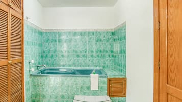 Deluxe Room, 2 Double Beds | Bathroom | Shower, towels, soap, shampoo