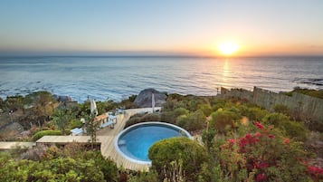 Outdoor pool, open 8:00 AM to 6:00 PM, pool umbrellas, sun loungers