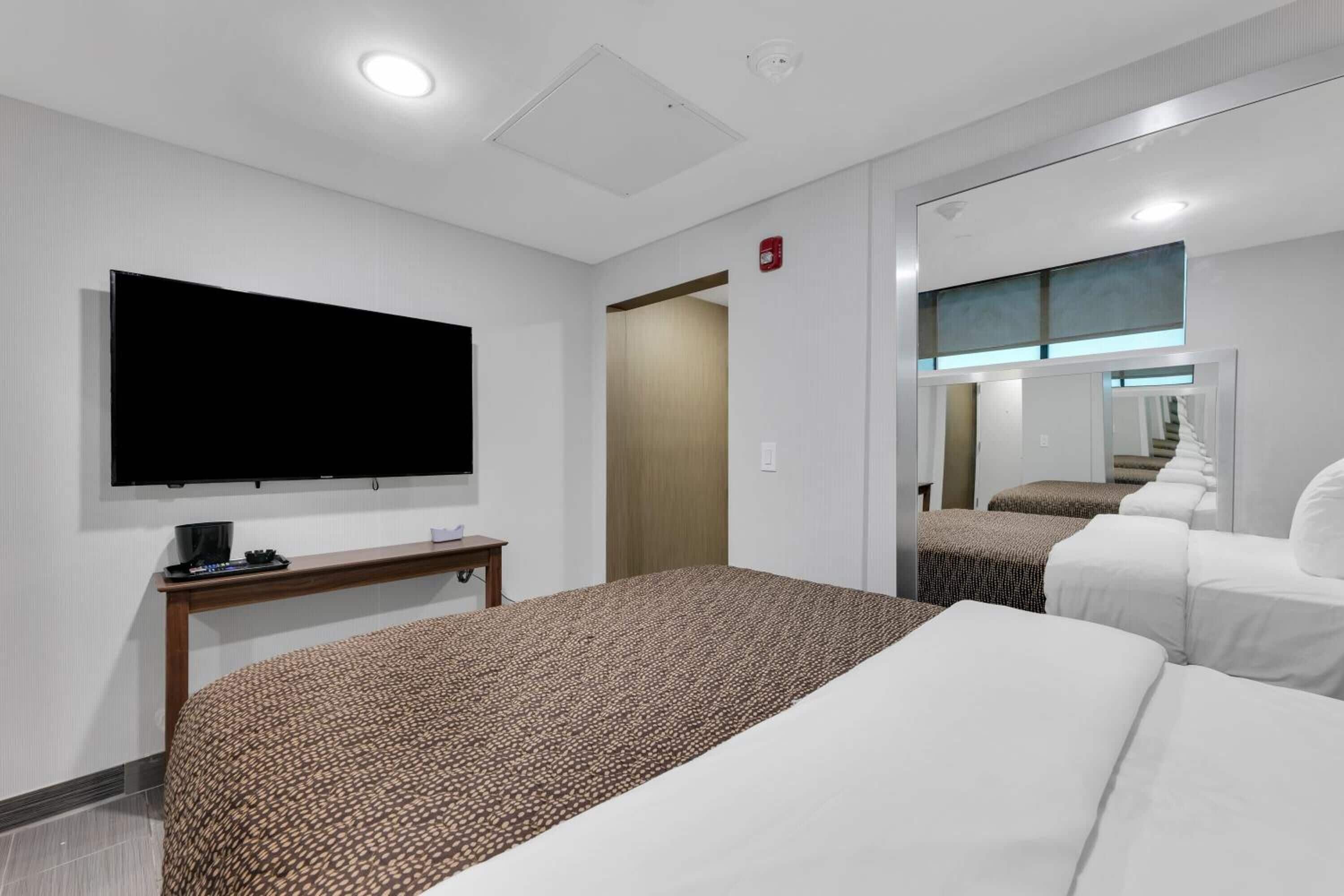 hypo-allergenic bedding, desk, laptop workspace, iron/ironing board