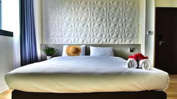 Hypo-allergenic bedding, in-room safe, laptop workspace