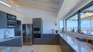 Luxury Villa, 3 Bedrooms | Private kitchen | Espresso maker, full-size fridge, microwave, oven - Earth Wind and Ocean 33 (Wilderness)