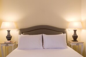 Apartamento | Tabla de planchar con plancha, wifi gratis, ropa de cama