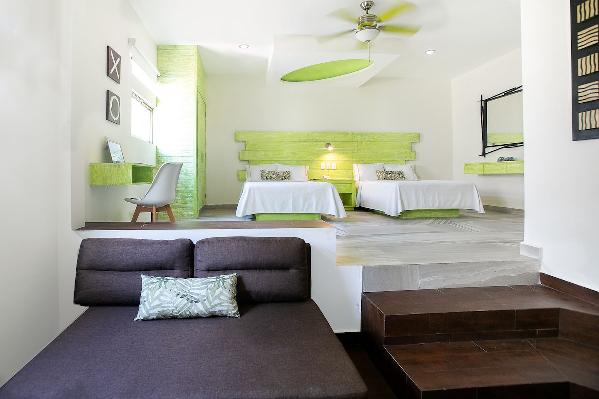 Suite, Multiple Beds | Living room | Flat-screen TV