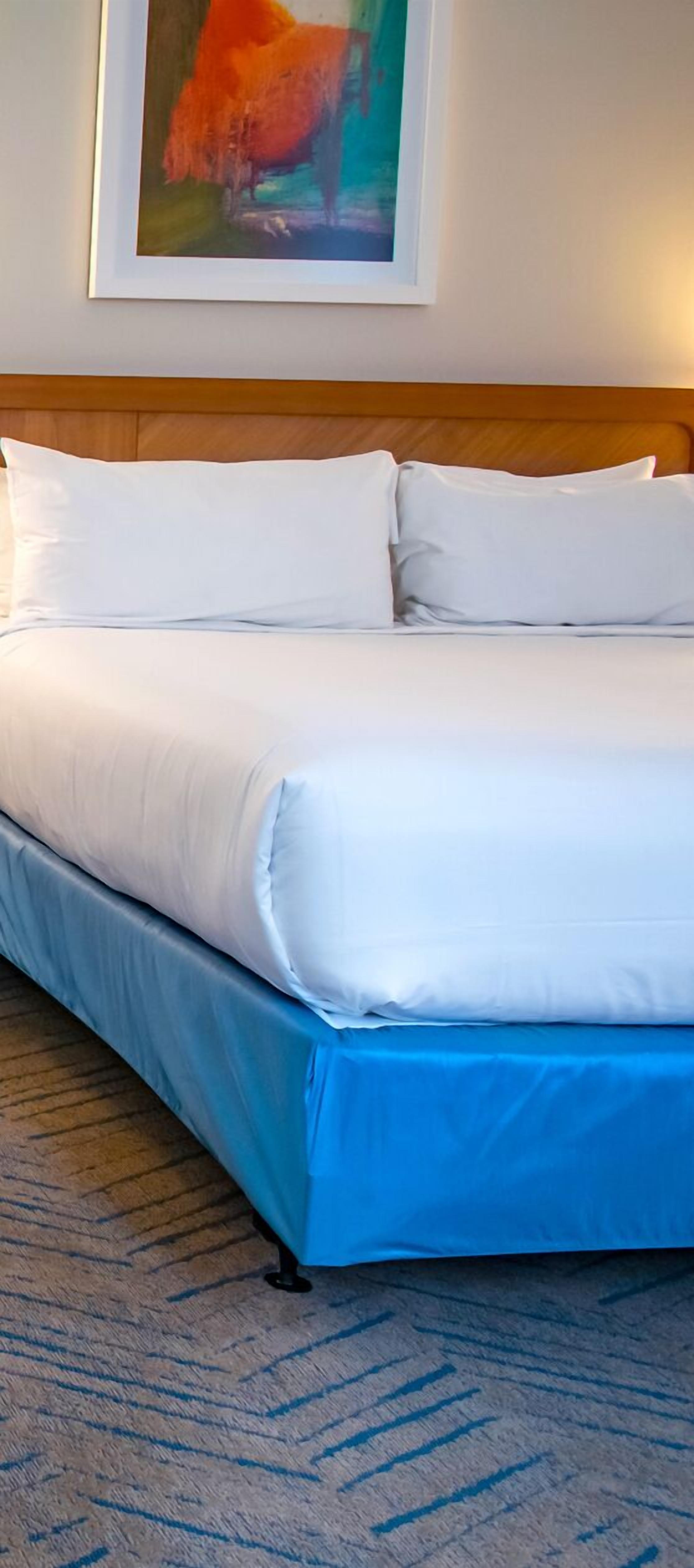 suite, multiple beds, pool view (kids suite with pool view, hearing ac) | in-room safe, laptop workspace, blackout curtains, iron/ironing board