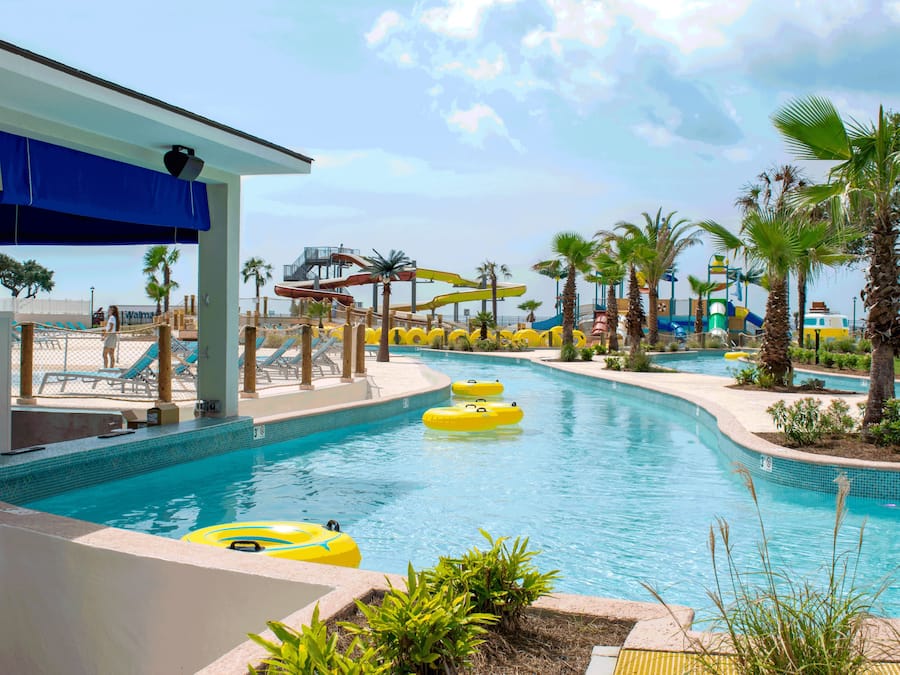 Seasonal outdoor pool, open 9:00 AM to 8:00 PM, pool loungers