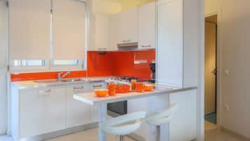 Apartment, 1 Bedroom | Private kitchen | Coffee/tea maker, electric kettle