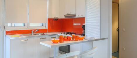 Apartment, 1 Bedroom | Private kitchen | Coffee/tea maker, electric kettle