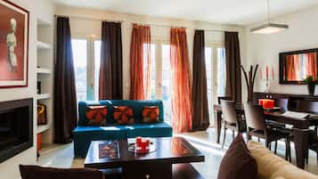 Apartment, 1 Bedroom | Living room | Flat-screen TV