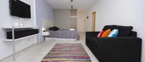 Standard Studio | Living area | Flat-screen TV