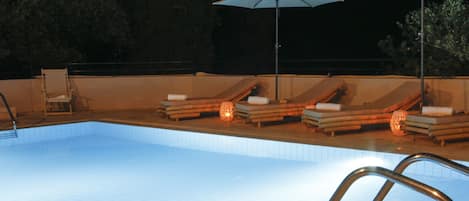 Seasonal outdoor pool, pool umbrellas, pool loungers