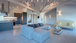 Appartement Deluxe, 2 chambres, terrasse, vue sur la mer | Aire de séjour