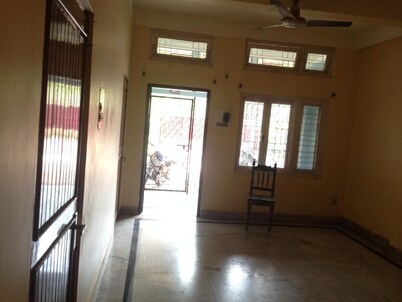 A Spacious Two Storey Residential building supporting a 3BHK 2 Bathroom Room